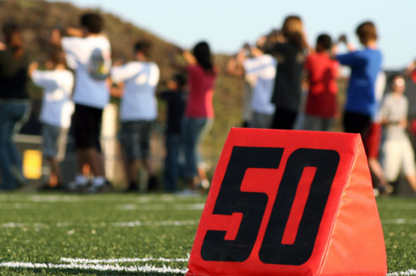 tips for your first band camp - a blurred image of a high school band practicing