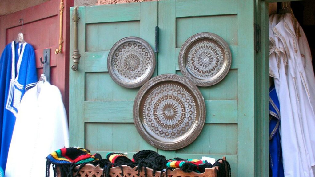 3 metal plates on a green door